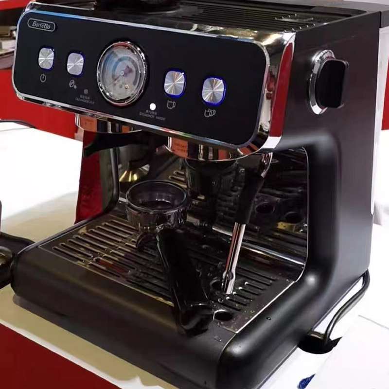 Two-group commercial espresso machine installed in a cafe