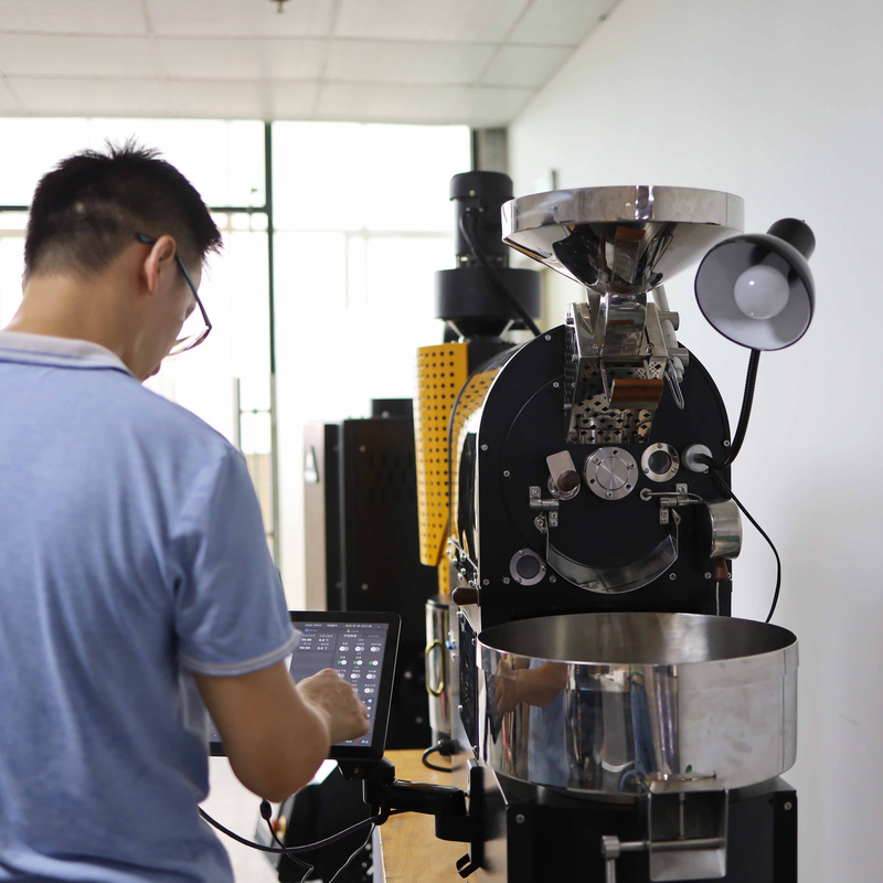 Yoshan coffee roaster – f4 test roast technician at touchscreen