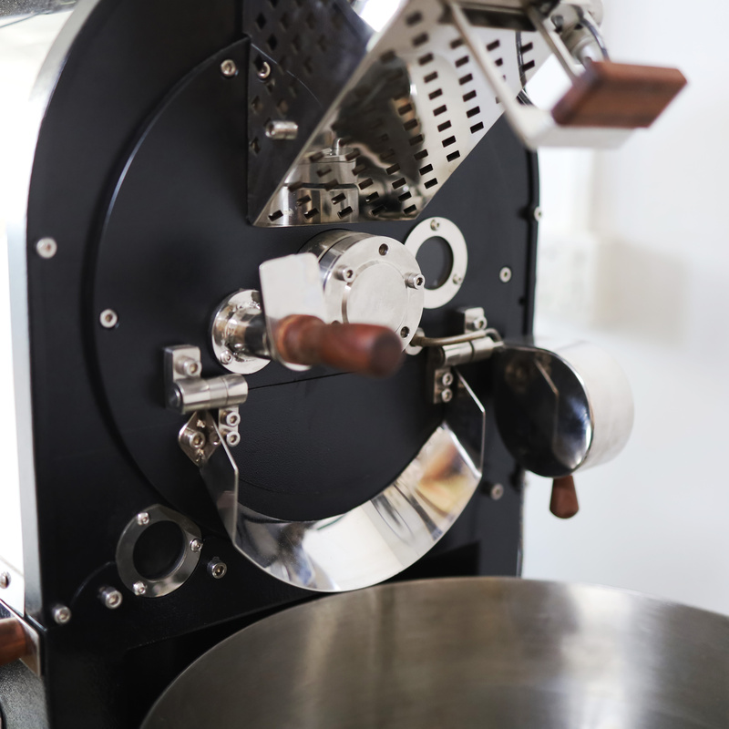 Drum and front plate detail of a Yoshan coffee roaster