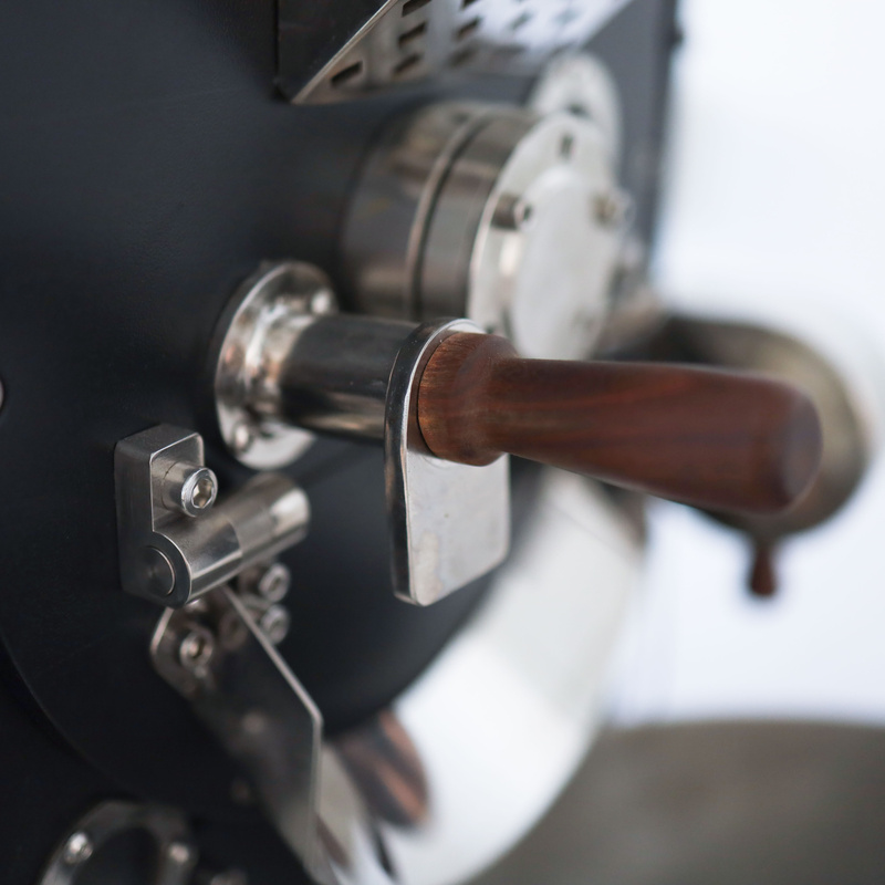 Trier sampling spoon on a Yoshan drum roaster