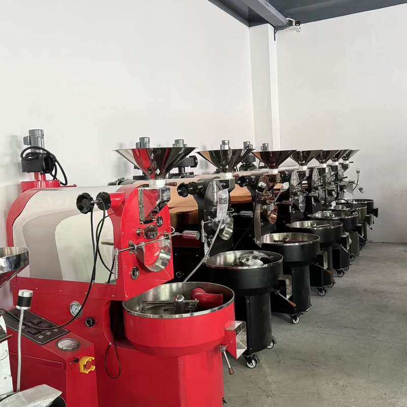 Red and black Yoshan roasters lined up in the workshop